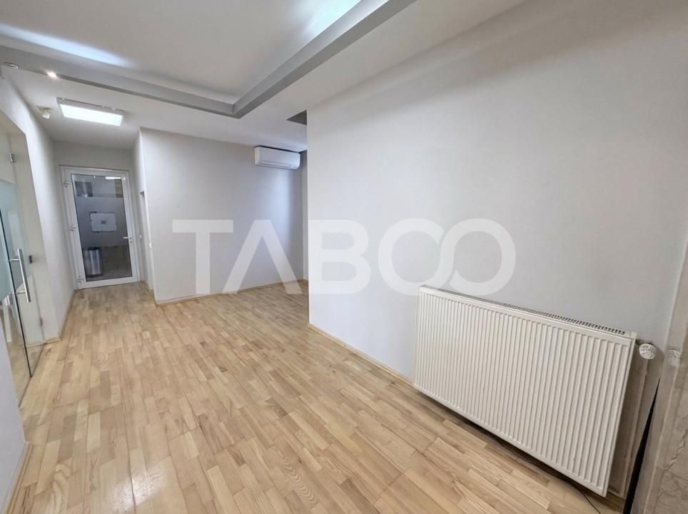 Cladire de birouri cu spatiu comercial la parter si 6 locuri parcare – fotografia 9 din 13