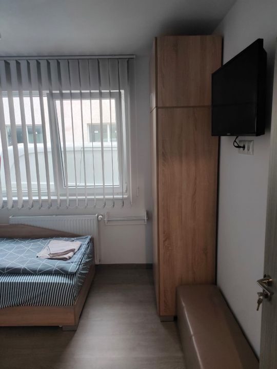 Clădire multifuncțională de vânzare – 24 locuinte, curte, randament ridicat – fotografia 15 din 28