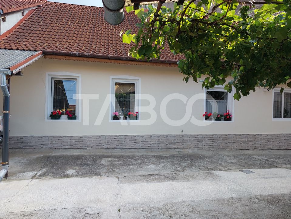 Casa 109 mp 4 camere pivnita terasa loc parcare curte comuna Cisnadie – fotografia 12 din 24