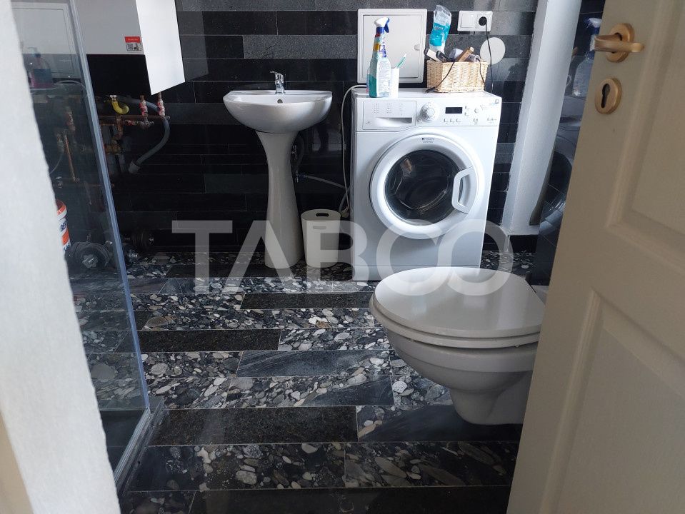 Casa de vanzare 3 camere 2 bucatarii 3 bai teren 340 mp Cisnadie – fotografia 11 din 36