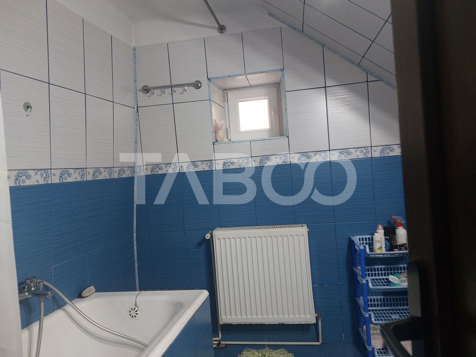 Casa in zona centrala 5 camere 2 bucatarii 3 bai curte comuna Cisnadie – fotografia 23 din 28