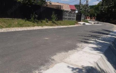 Teren 2500 mp intravilan Smeura – cadru natural, pârâu pe proprietate, utilități