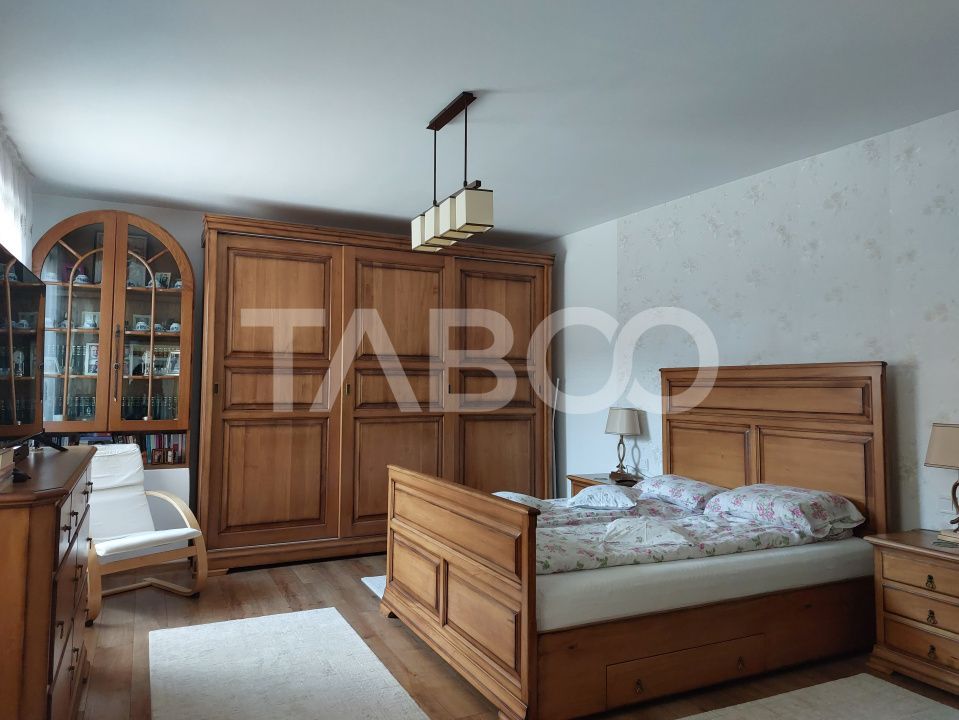Casa 109 mp 4 camere pivnita terasa loc parcare curte comuna Cisnadie – fotografia 1 din 24