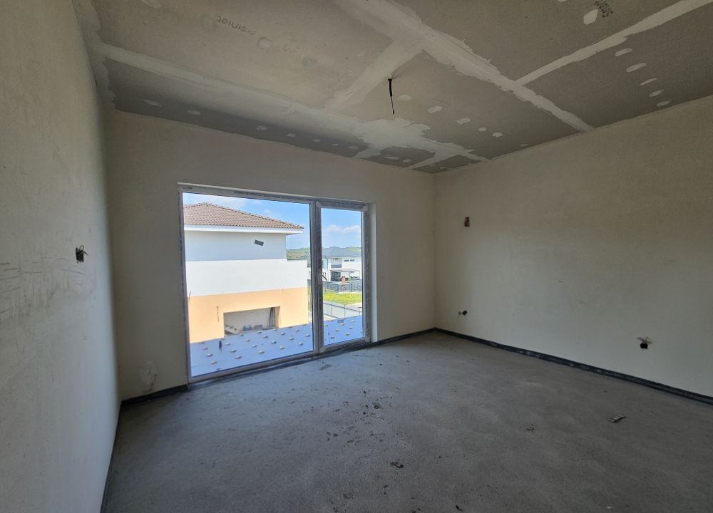Casa individuala cu garaj si terase generoase in Chinteni – fotografia 14 din 21