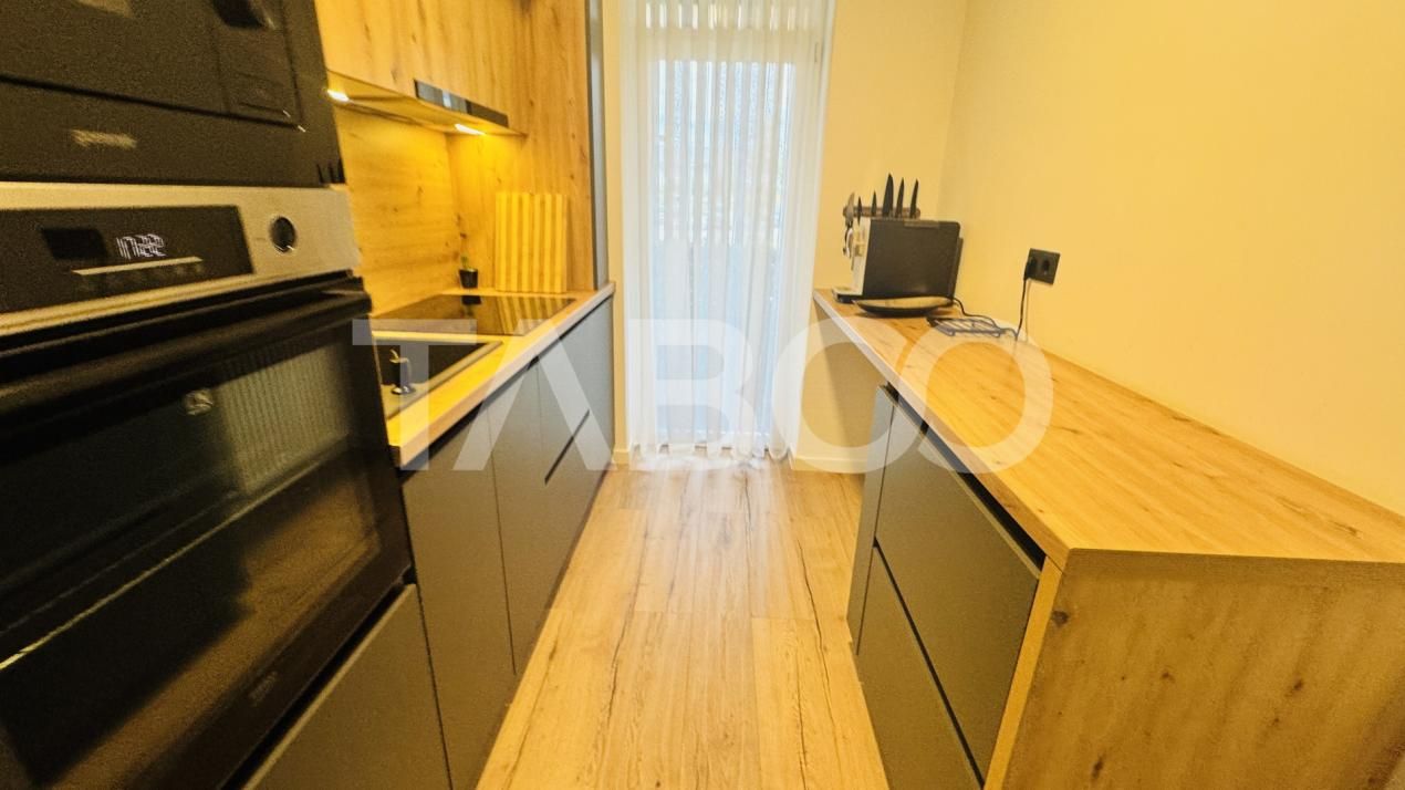 Apartament modern 63mpu 3 camere 2 bai 2 parcari de vanzare Sibiu – fotografia 11 din 11
