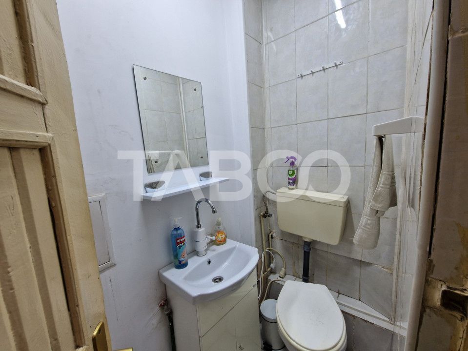 Apartament central 4 camere spatiu comercial garaj si pivnita Sibiu – fotografia 10 din 16