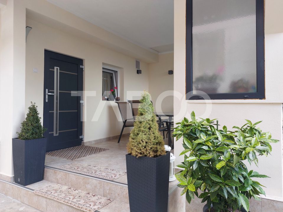 Casa 109 mp 4 camere pivnita terasa loc parcare curte comuna Cisnadie – fotografia 20 din 24