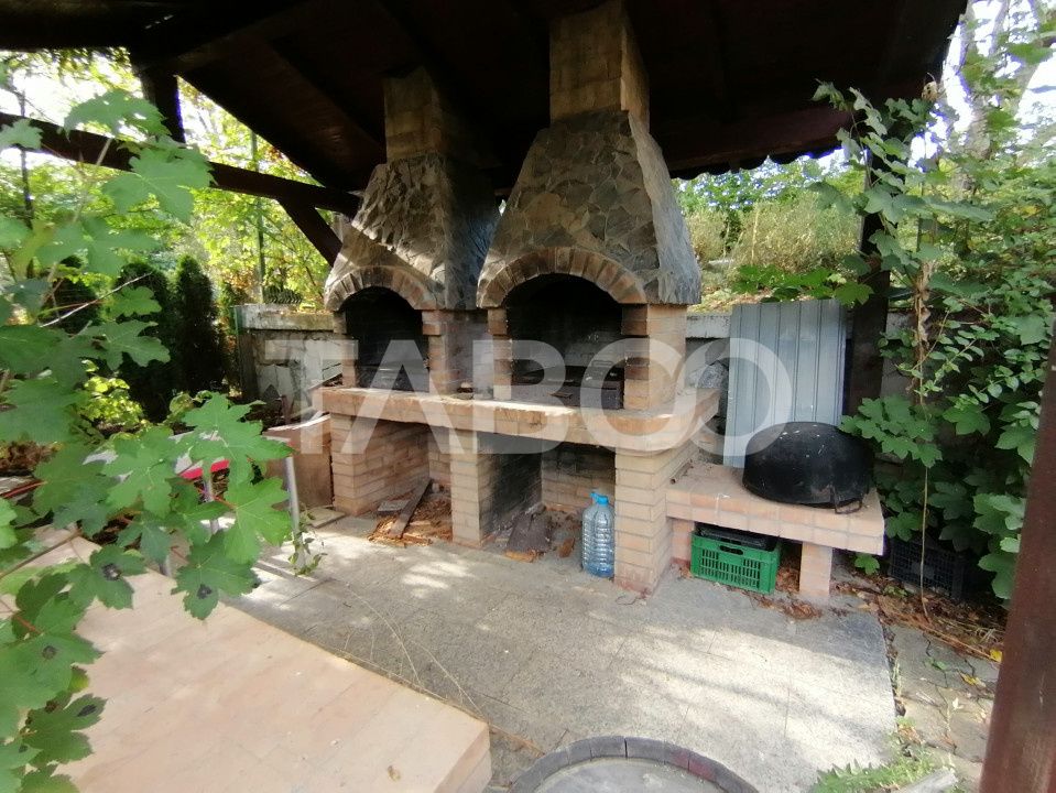 Pensiune 13 camere 16 bai sauna piscina si teren 1565 mp Cisnadioara – fotografia 42 din 42
