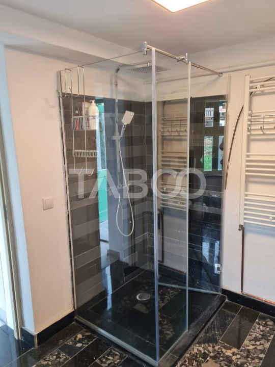 Casa de vanzare 3 camere 2 bucatarii 3 bai teren 340 mp Cisnadie – fotografia 30 din 36