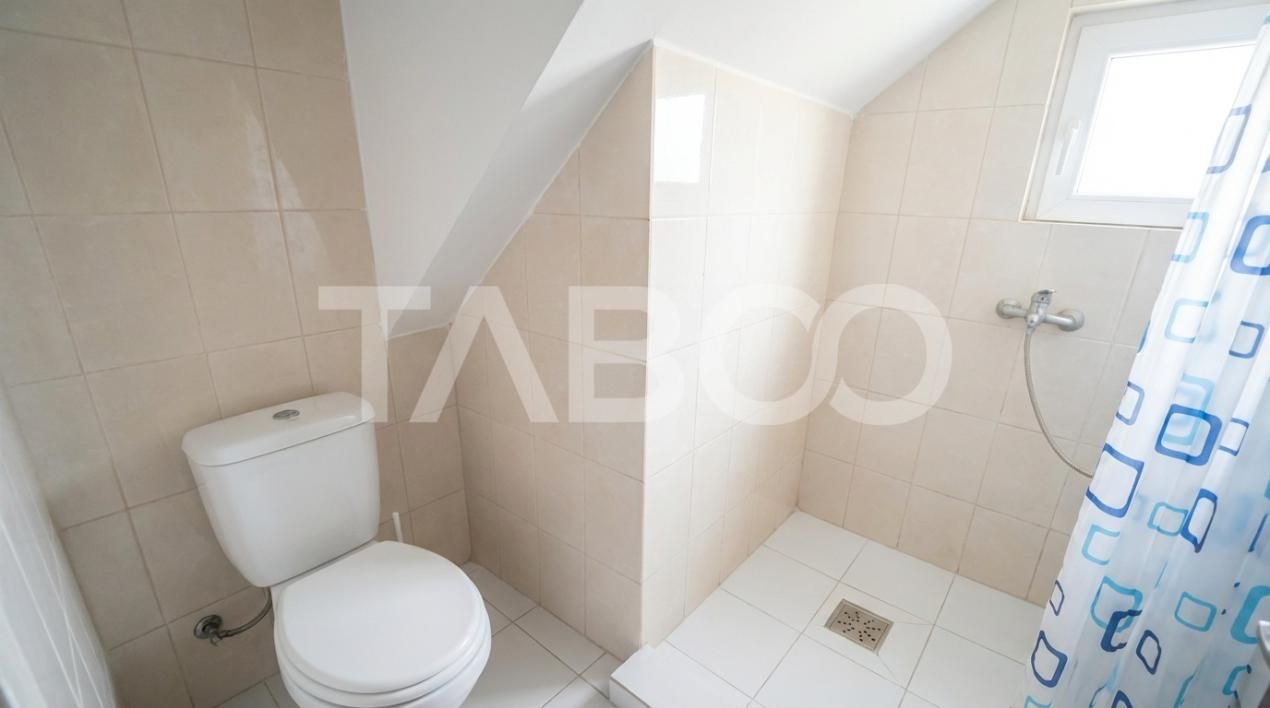 Casa individuala 4 camere cu curte de 550 mp 2 bai Cristian Sibiu – fotografia 10 din 11