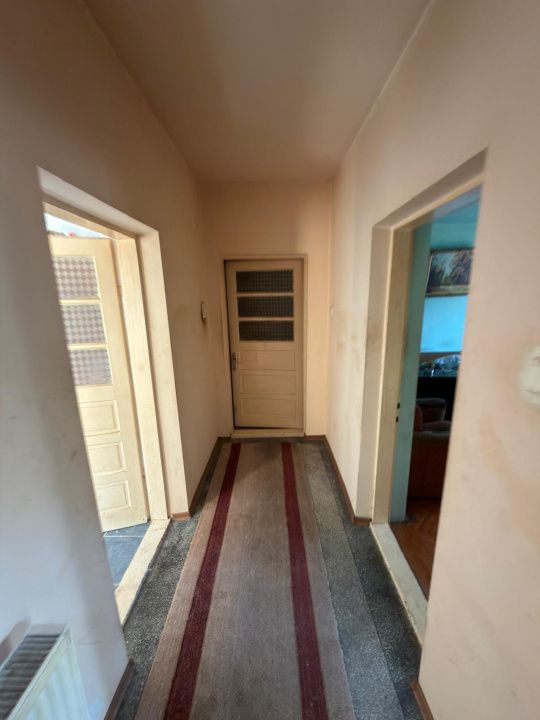 Casă P+1 de vânzare, 4 camere, aproape de centru, ideală pentru locuit – fotografia 5 din 9