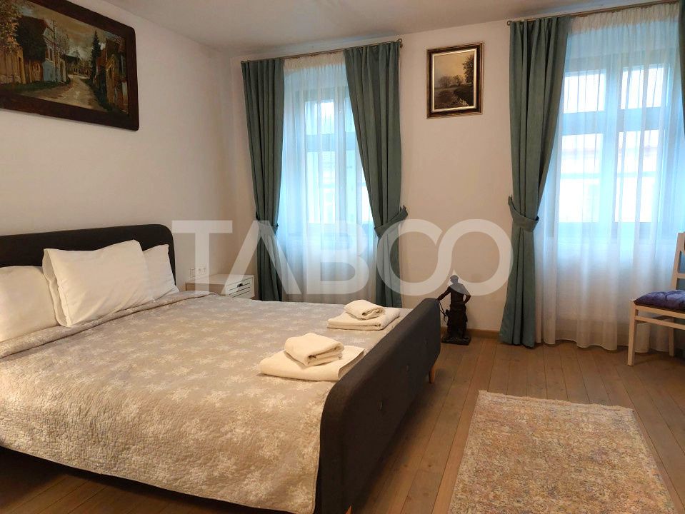 Casa 380 mp cu 6 apartamente individuale mobilate utilate Cisnadie – fotografia 7 din 36