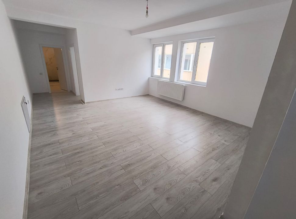 Apartament de vanzare 2 camere, 58mp + balcon, an 2025, central, strada Eroilor! – fotografia 2 din 9