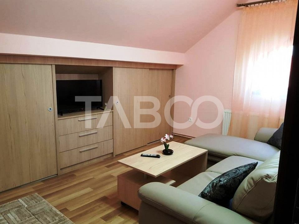 Apartament de inchiriat  56 mpu 2 camere mansarda in vila Selimbar – fotografia 2 din 11