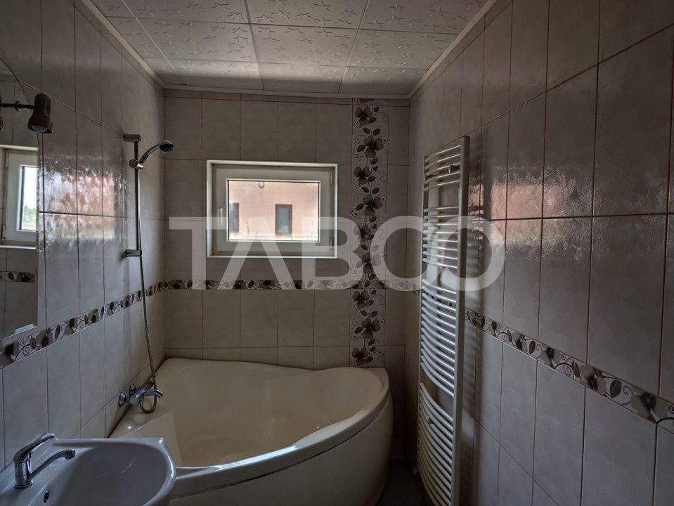 Casa de vanzare  cu garaj si curte 147 mpu in Sura Mare Sibiu – fotografia 10 din 11