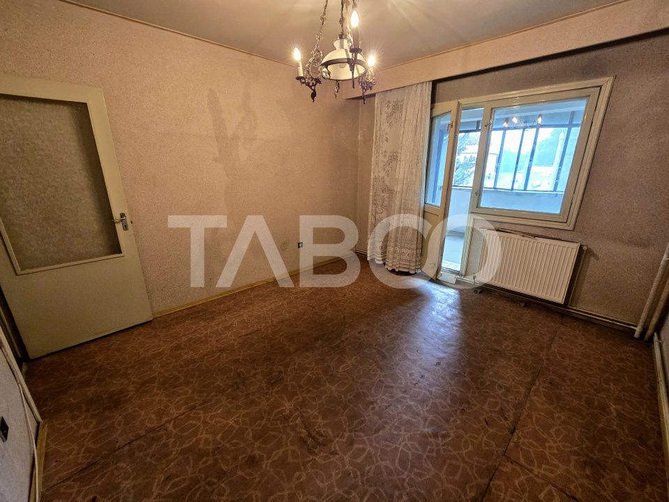 Apartament decomandat 4 camere 4 balcoane 2 bai etaj 1 Central Sibiu – fotografia 13 din 22