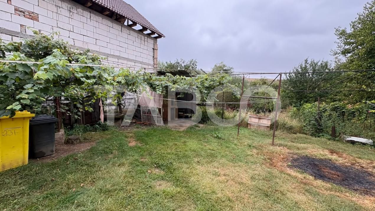 Casă individuala de vanzare cu 800 mp de teren in sat Rusi din Sibiu – fotografia 7 din 9