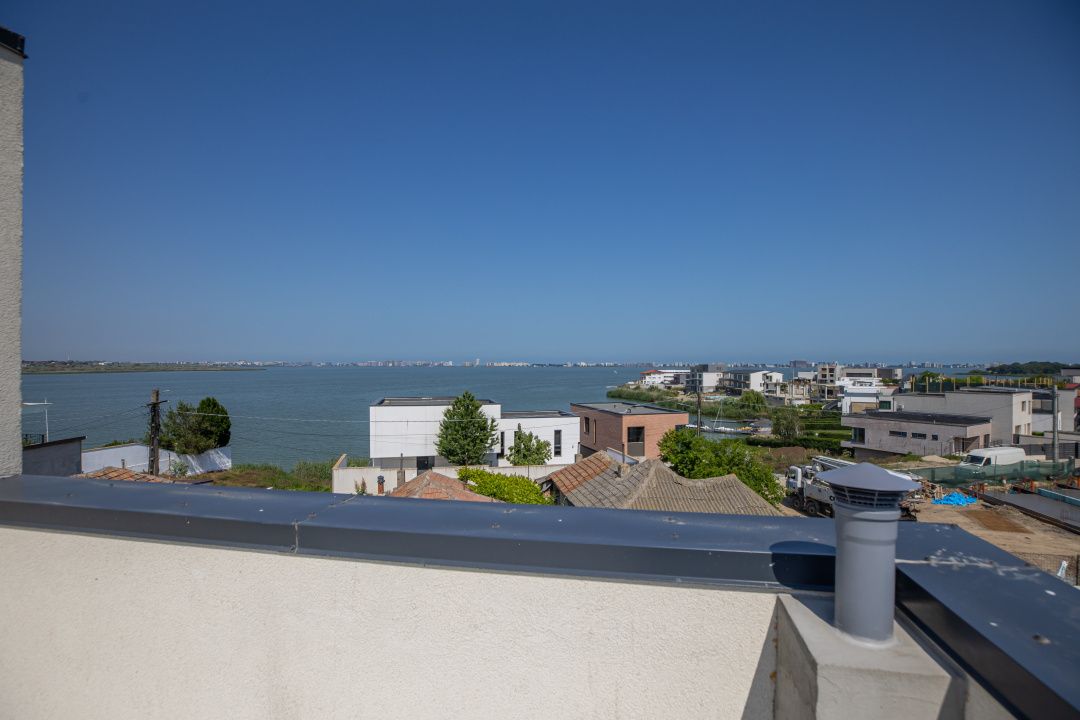 Vilă P+1 cu vedere la lac – terasă panoramică 50,2 mp, teren 212 mp – fotografia 3 din 67
