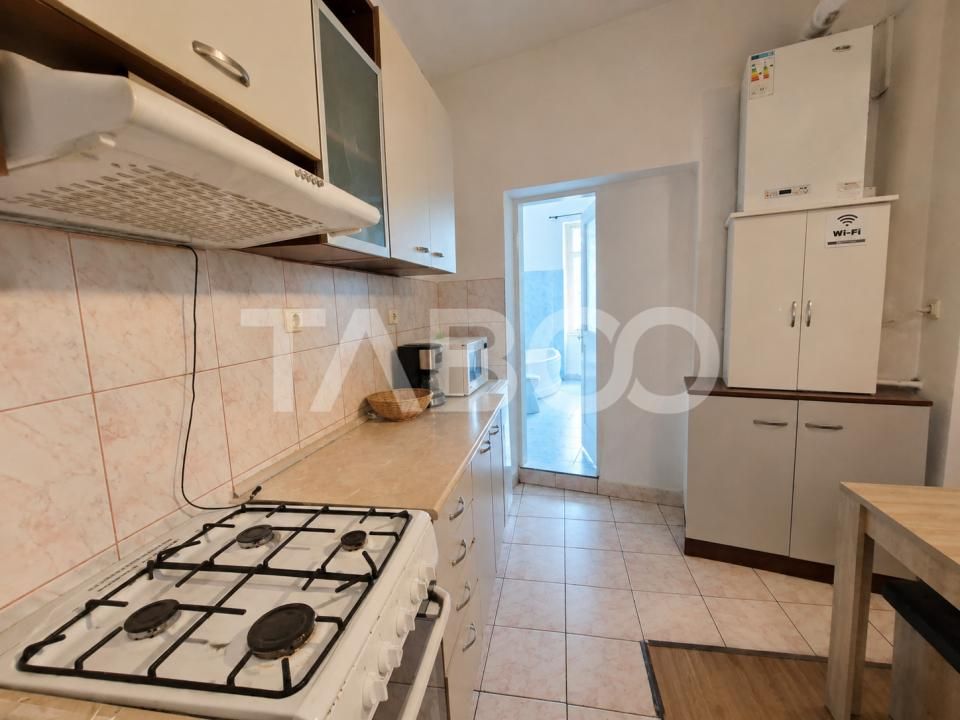 Garsoniera de vanzare aproape de centru cu bucatarie separata – fotografia 6 din 19