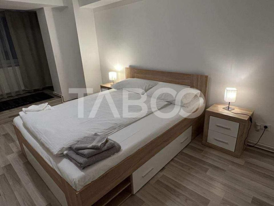 Apartament modern de inchiriat 3 camere etaj 1 Centru - Constitutiei – fotografia 1 din 18