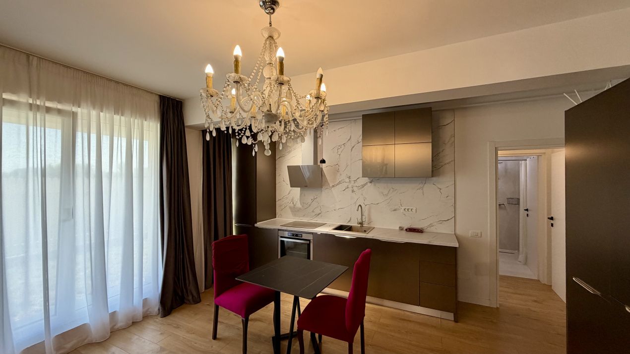 Apartament 2 camere cu grădină de 50 mp, parcare și curățenie inclusă – fotografia 5 din 11