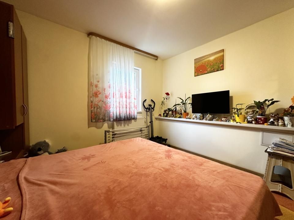 Apartament cu 3 camere intr-o zona linistita- Dambovita – fotografia 7 din 15