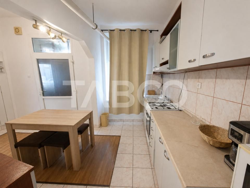Garsoniera de vanzare aproape de centru cu bucatarie separata – fotografia 15 din 19