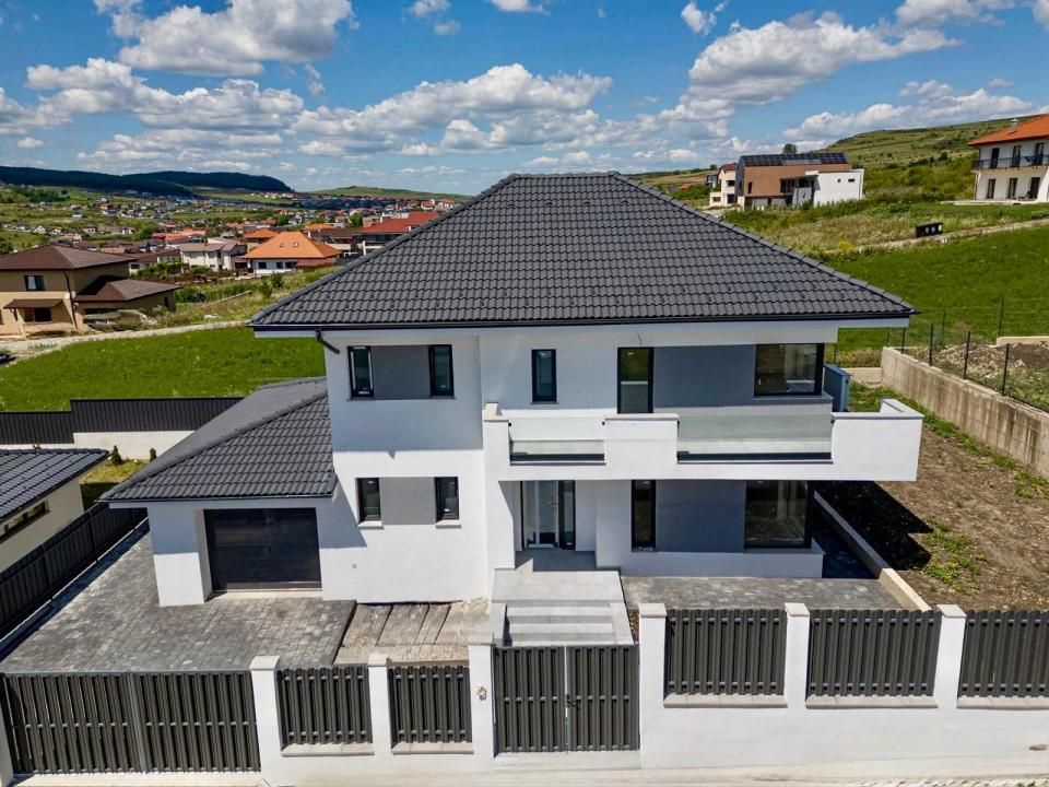 Casa unifamiliala 140mpu cu garaj la intrare in Chinteni – fotografia 1 din 22