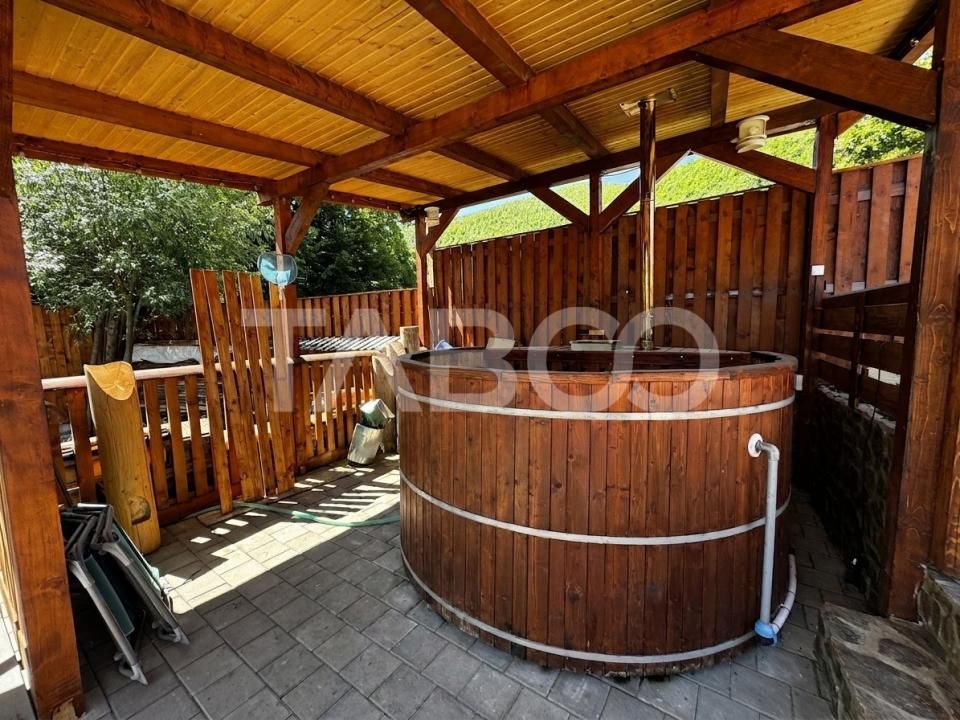 Casa de vis la munte 7 camere 5 bai ciubar teren 558 mp Rasinari Sibiu – fotografia 2 din 32