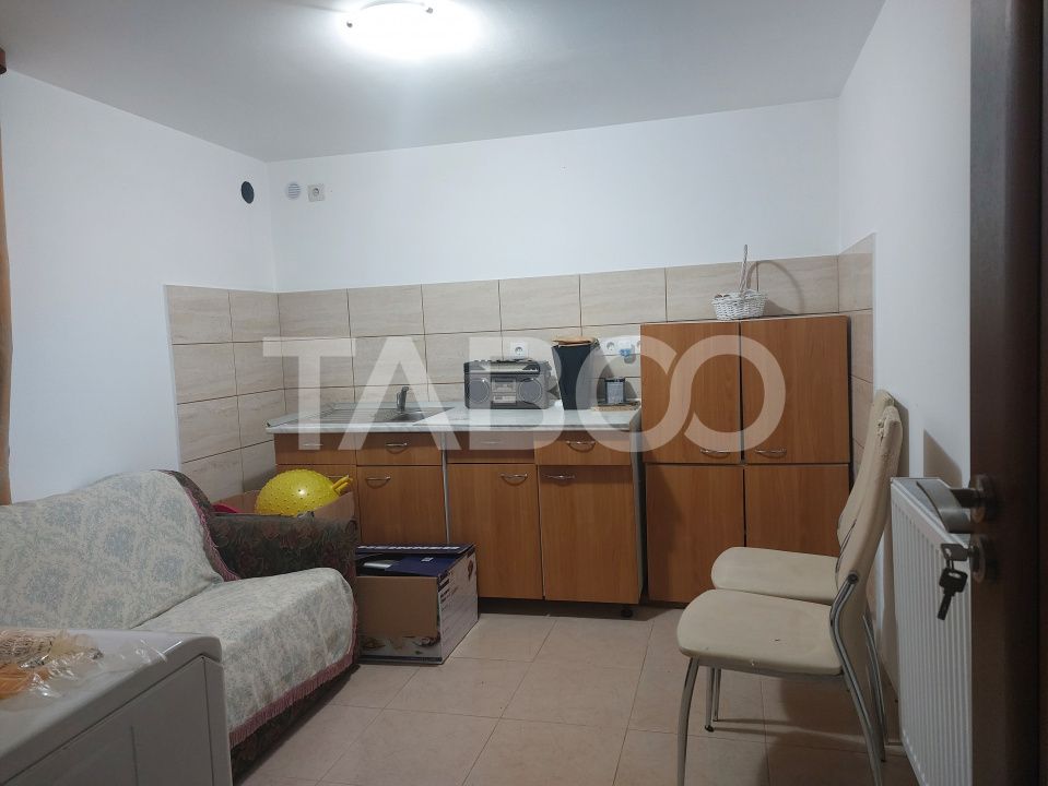 Casa in zona centrala 5 camere 2 bucatarii 3 bai curte comuna Cisnadie – fotografia 15 din 28