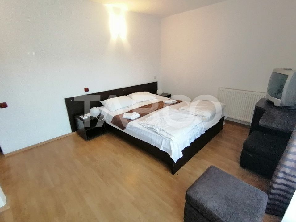Pensiune 13 camere 16 bai sauna piscina si teren 1565 mp Cisnadioara – fotografia 15 din 42