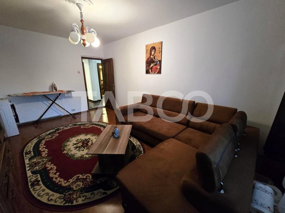 Apartament 3 camere decomandat 72 mpu 2 bai pivnita Vasile Aaron Sibiu – fotografia 2 din 12
