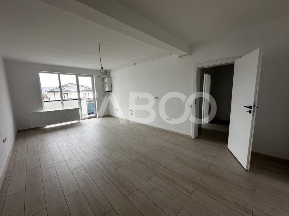 Apartament decoamandat 71 mpu 2 camere dressing balcon etaj 1 Selimbar – fotografia 2 din 7