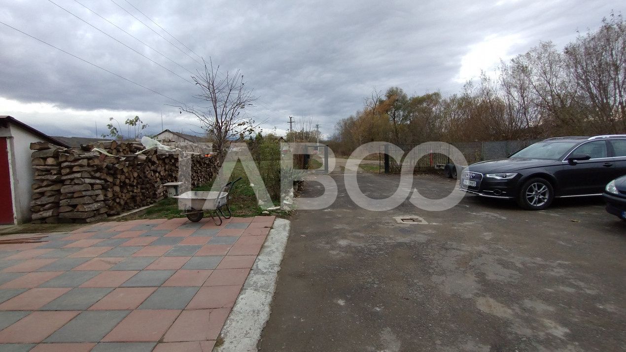 Afacere si locuinta cu teren de 1450 mp de vanzare in Rausor – fotografia 3 din 24