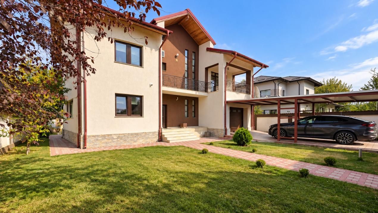 Proprietate exclusivistă cu piscină, garaj și teren de 900 mp – fotografia 2 din 24