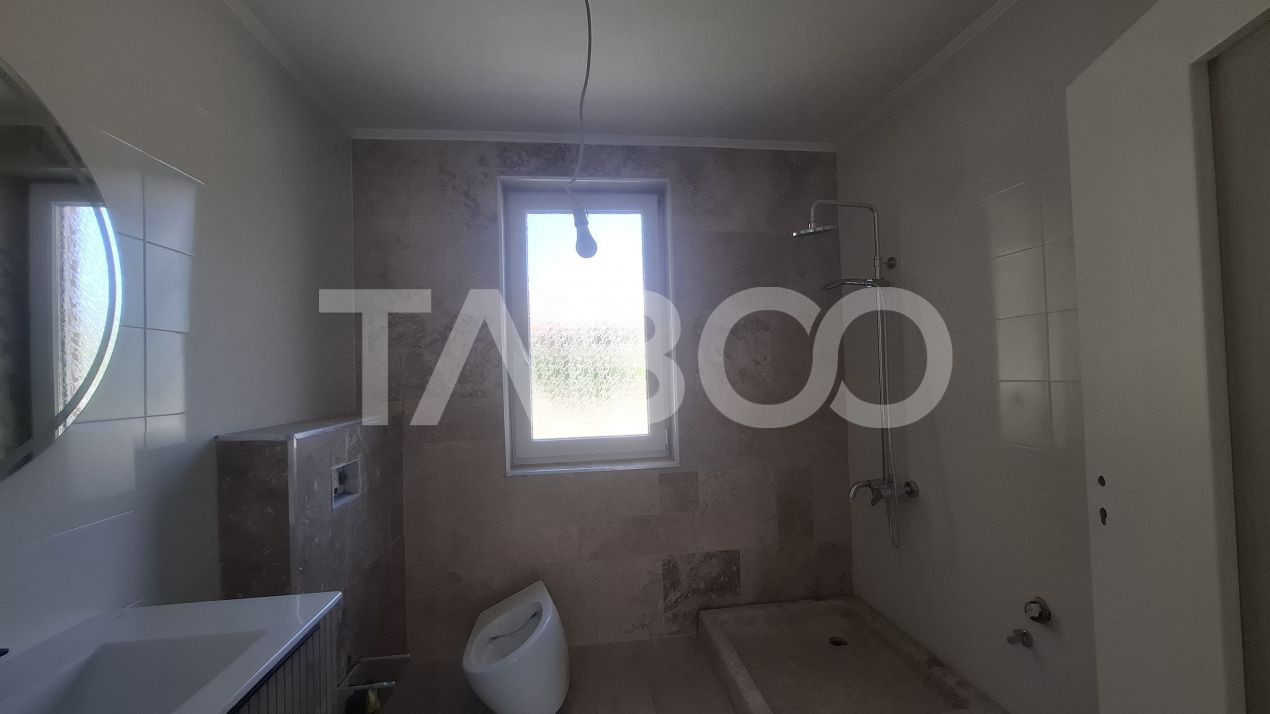 Casa de vanzare 405 mp utili 2 garaje 250 mp terase Slimnic Sibiu – fotografia 13 din 19