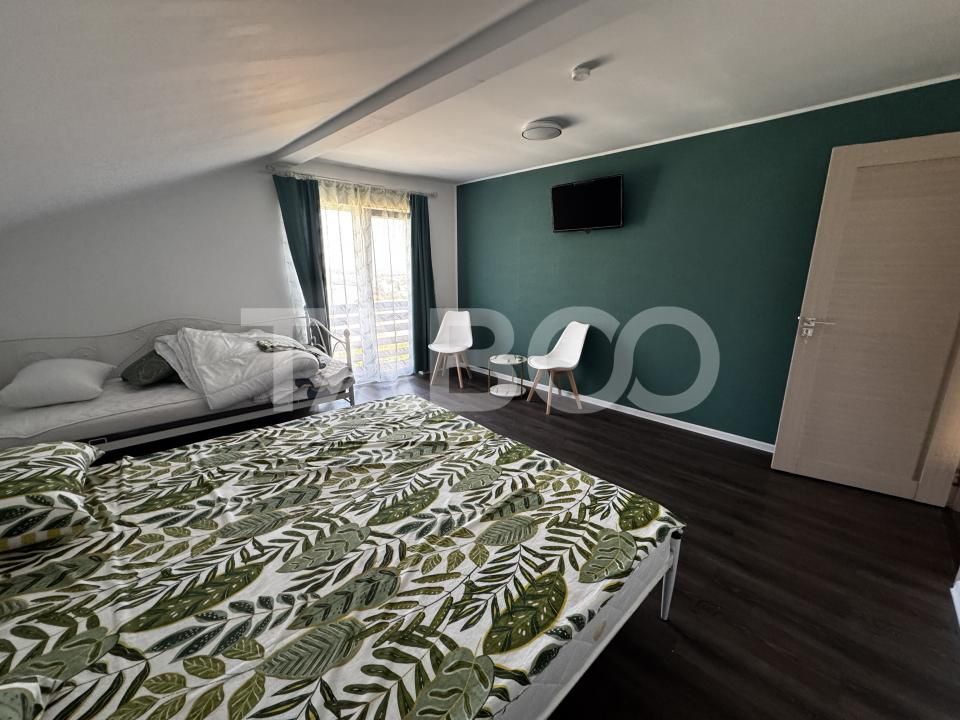 Casa de vis la munte 7 camere 5 bai ciubar teren 558 mp Rasinari Sibiu – fotografia 27 din 32