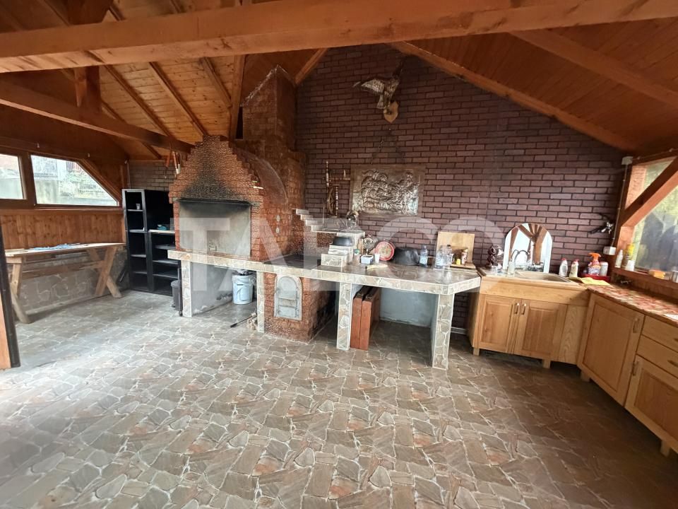 Casa cu potential de investitie 7 camere foisor 4 bazine de pesti – fotografia 20 din 28