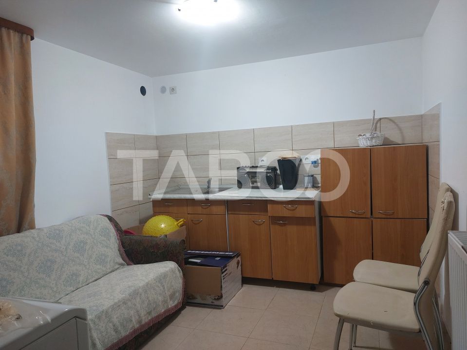 Apartament la casa 119 mpu 5 camere 2 bucatarii 3 bai gradina Cisnadie – fotografia 7 din 19
