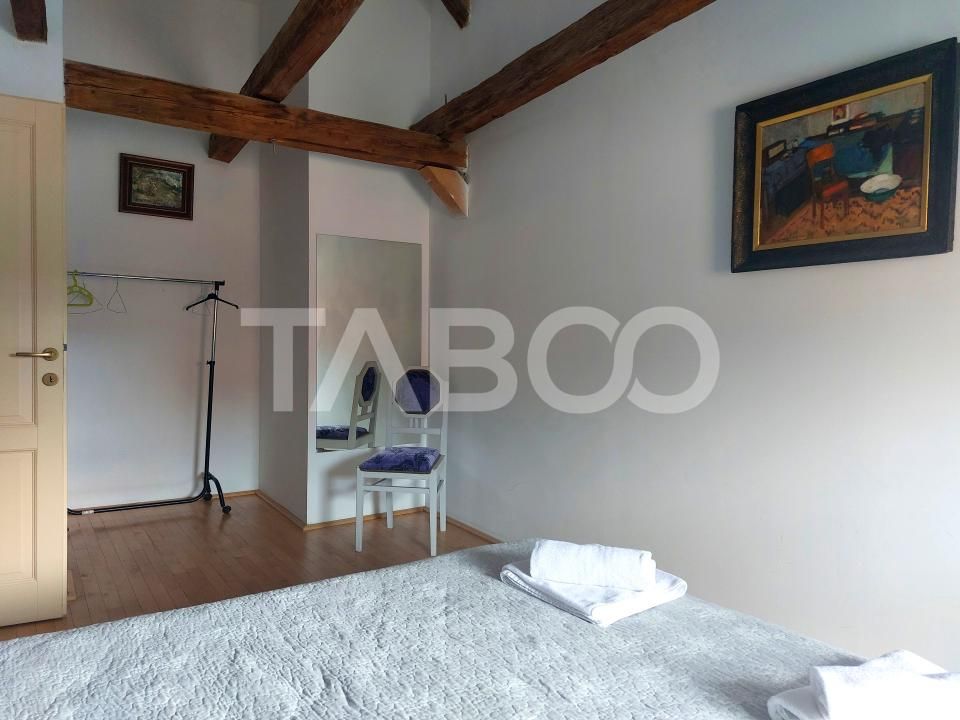 Casa 380 mp cu 6 apartamente individuale mobilate utilate Cisnadie – fotografia 3 din 36
