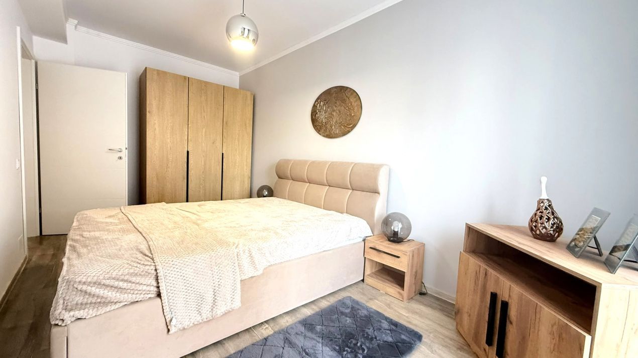 Apartament 2 camere, decomandat, parcare, balcon, mobilat și utilat–Florești – fotografia 4 din 10