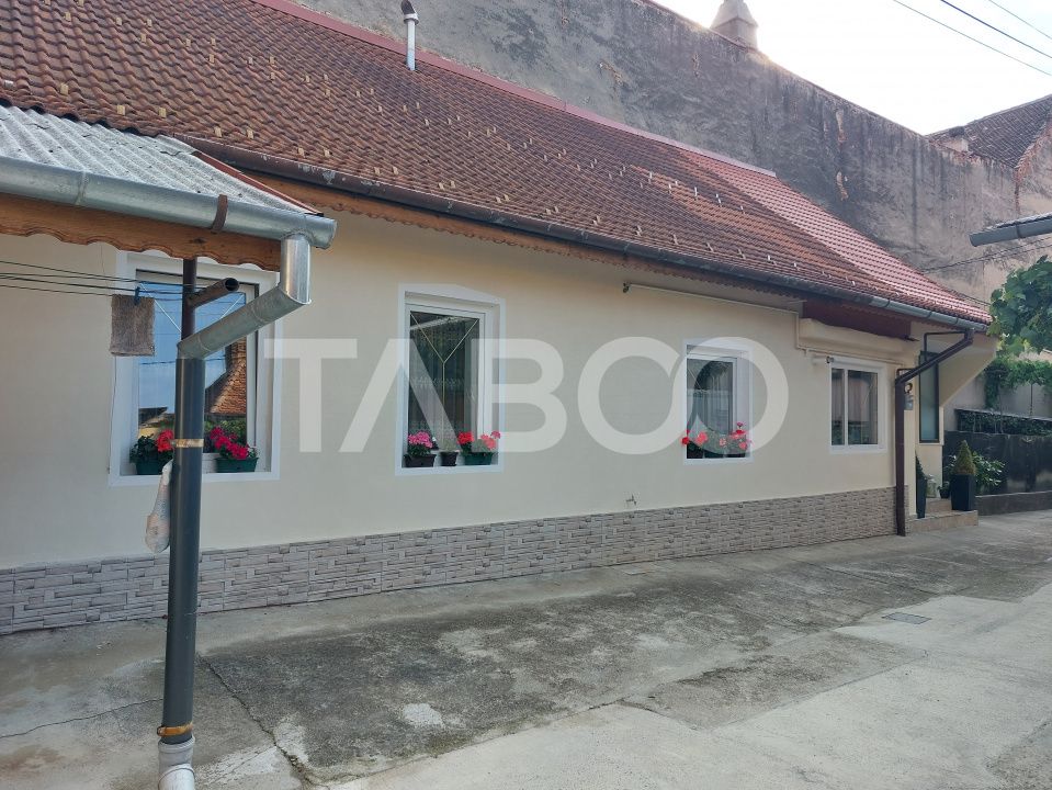 Casa 109 mp 4 camere pivnita terasa loc parcare curte comuna Cisnadie – fotografia 19 din 24