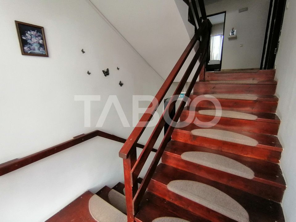 Pensiune 13 camere 16 bai sauna piscina si teren 1565 mp Cisnadioara – fotografia 36 din 42