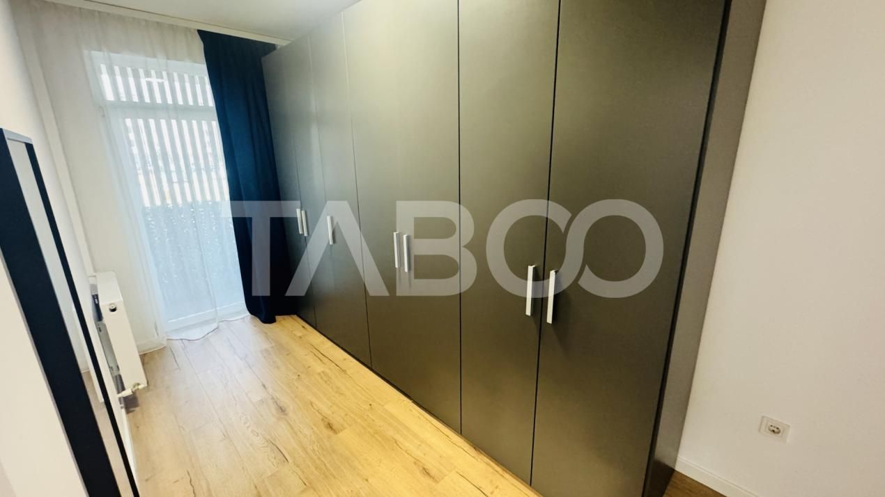 Apartament modern 63mpu 3 camere 2 bai 2 parcari de vanzare Sibiu – fotografia 4 din 11