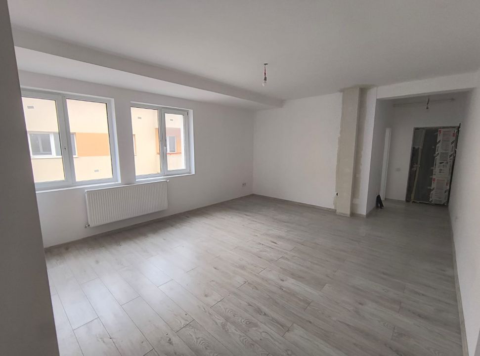Apartament de vanzare 2 camere, 58mp + balcon, an 2025, central, strada Eroilor! – fotografia 3 din 9