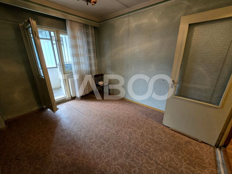 Apartament decomandat 4 camere 4 balcoane 2 bai etaj 1 Central Sibiu – fotografia 11 din 22