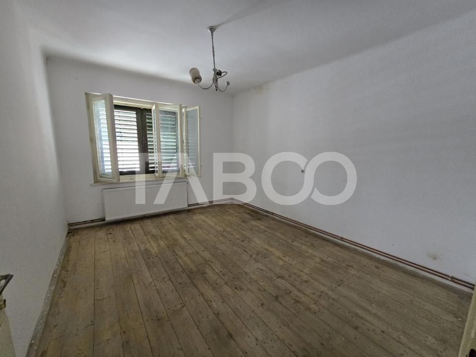 Casa de vanzare cu teren 412 mp pivnita garaj in Terezian Sibiu – fotografia 5 din 34
