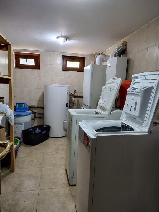 Vilă exclusivistă de vânzare în Iași – 450 mp utili și teren de 2.000 mp – fotografia 18 din 23