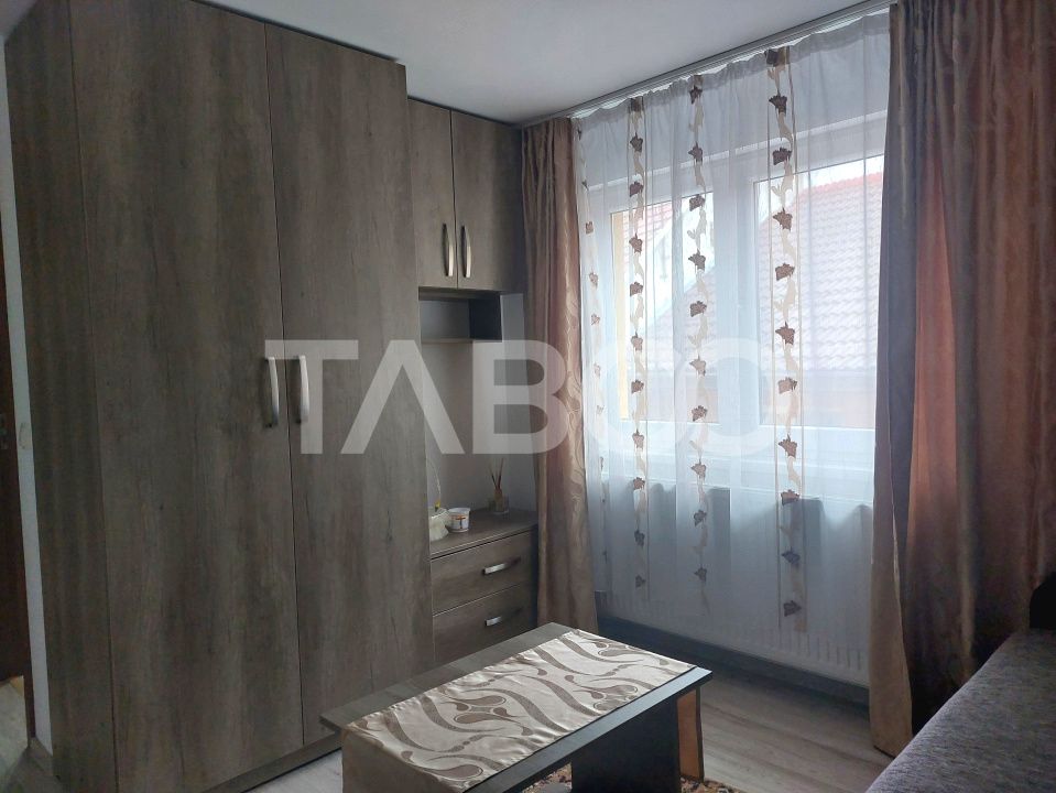 Casa in zona centrala 5 camere 2 bucatarii 3 bai curte comuna Cisnadie – fotografia 3 din 28