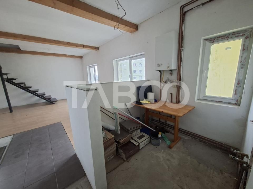 Apartament la mansarda de vanzare 3 camere Vasile Aaron – fotografia 6 din 11